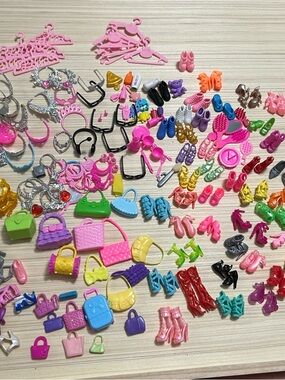 Doll accessories lot of shoes, brushes, tiaras, necklaces, purses, etc